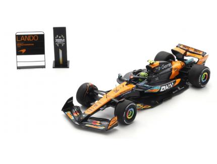 McLaren MCL39 No.4 3rd Abu Dhabi GP 2025 Lando Norris F1 Drivers' World Champion 2025 avec traces de donuts et panneau