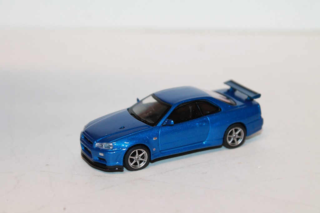 NISSAN GTR R34 SKYLINE BLEU MINI GT 1/64°